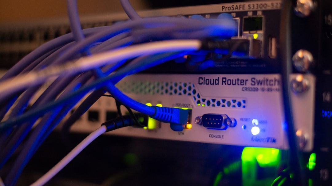 how to unblock ip address from router — a close up of a network with wires connected to it