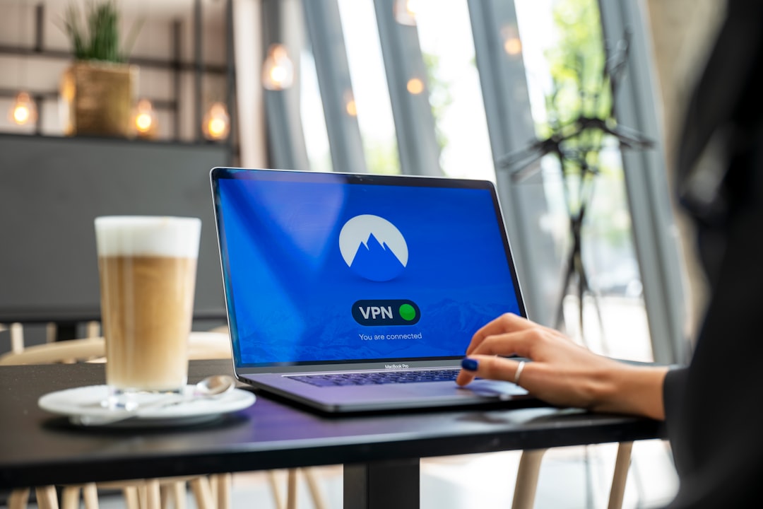 how to bypass geo blocking with vpn — person using black laptop computer