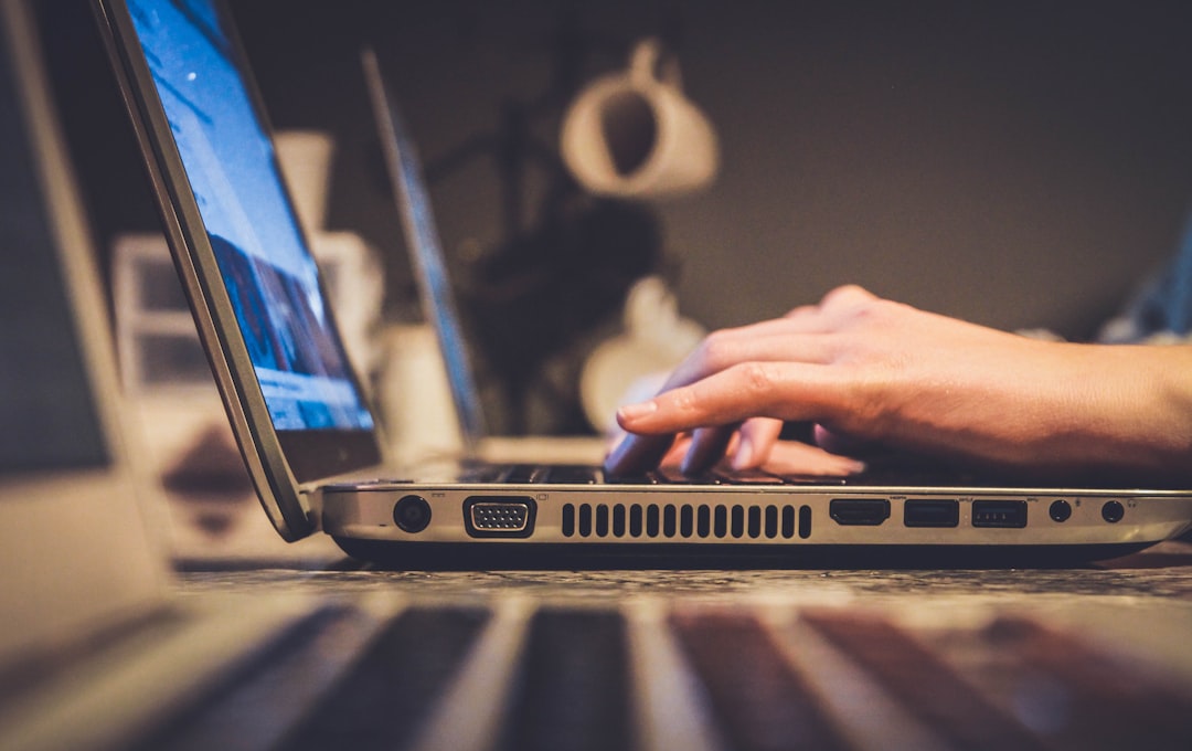 how to unblock any website without vpn — person using silver laptop computer on desk